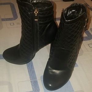 Black leather ankle boots